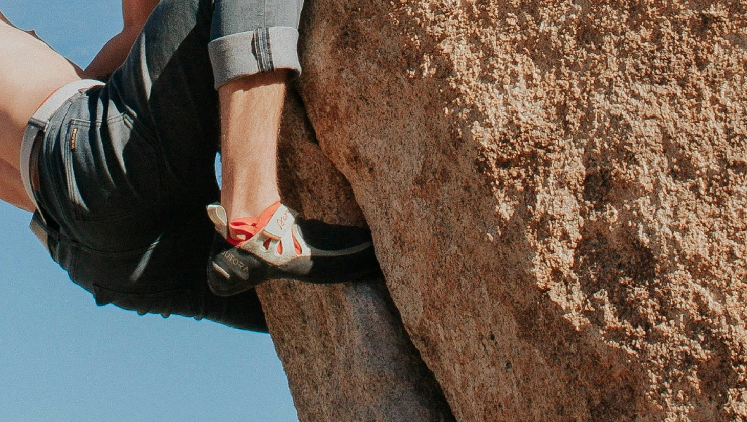 Close up of climbing shoe rubber on rock